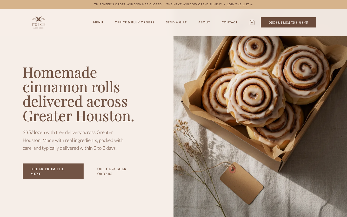 TWICE Baked Goods homepage with glazed cinnamon rolls